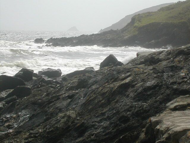Perbargus Point West Portholland Looking west from the Portholland sea defence wall to Perbargus Point with Shag Rock a mile or so distant.