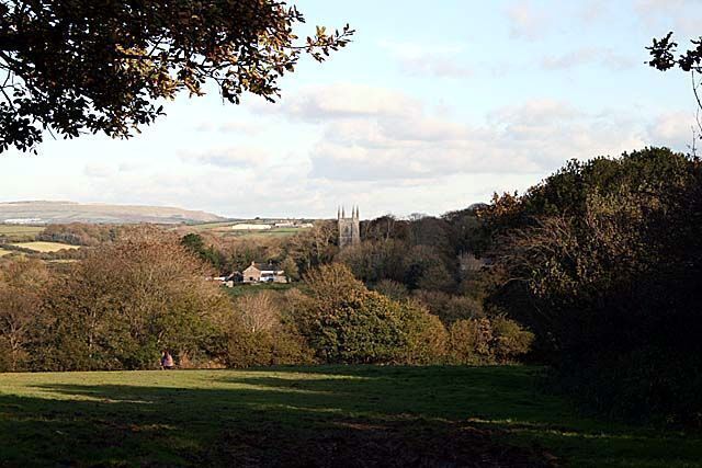 Looking across the valley to Ladock. Ladock church was dedicated in 1268 to St Ladocus. The tower is the second tallest in Cornwall being "one barley grain" (3/8in or 9.5mm) shorter than Probus. See 194407