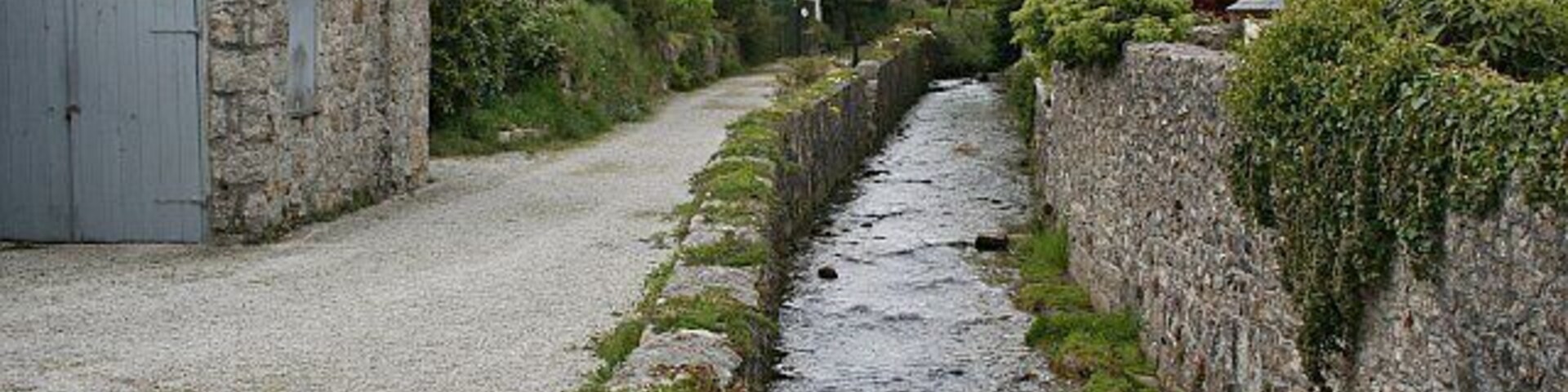 The River Kennall near Foundry, Stithians. This area of Stithians village is known as Foundry, a term which probably implies there was some degree of industrial activity in the past. The water from this river would very likely have powered it.