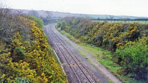 Site of Grampound Road station. View SW, towards Truro and Penzance: ex-GWR Plymouth - Penzance main line. The station was, which was behind the camera, closed 5/10/64 but the line has of course survived, although singled on this stretch at that time - but doubled again more recently.