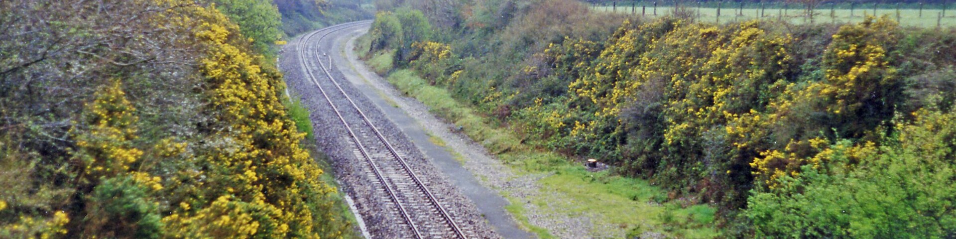 Site of Grampound Road station. View SW, towards Truro and Penzance: ex-GWR Plymouth - Penzance main line. The station was, which was behind the camera, closed 5/10/64 but the line has of course survived, although singled on this stretch at that time - but doubled again more recently.