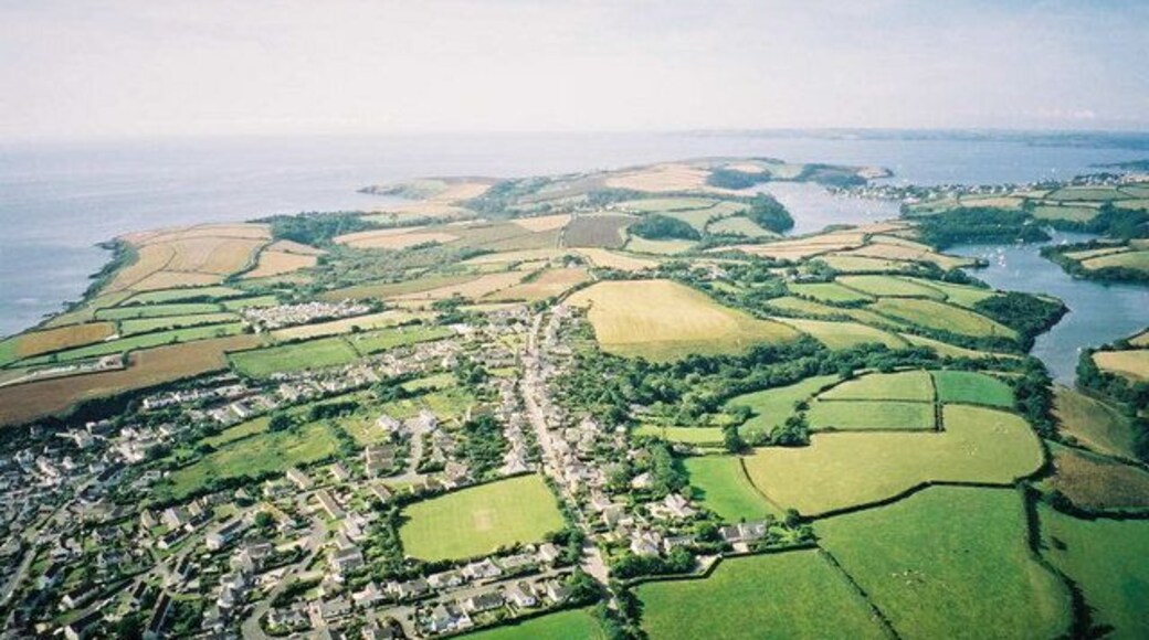 Aerial view from Paramotor of Roseland Peninsula - Portscatho in foreground, St Anthony's Head and Fal Estuary in distance
