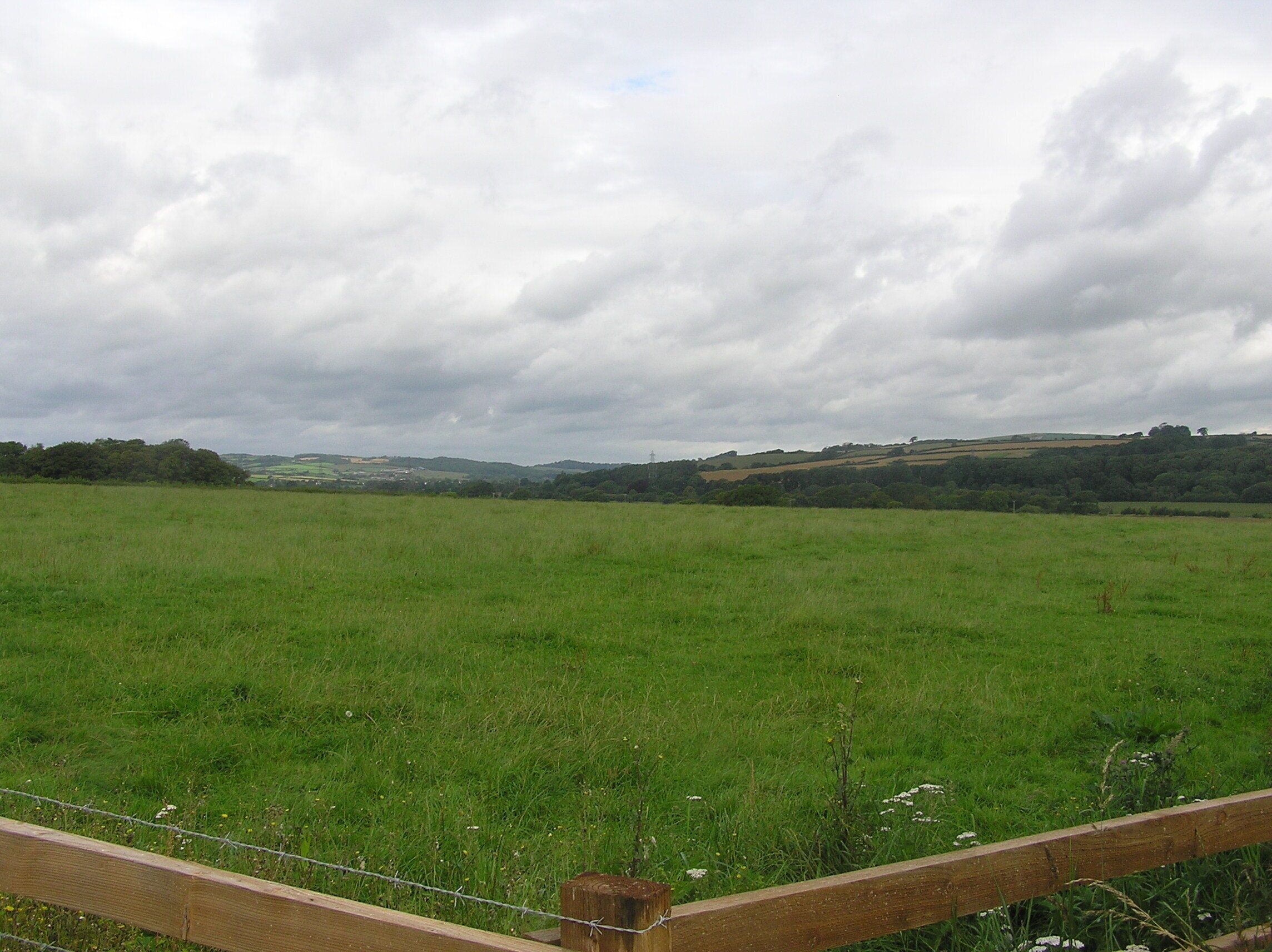 Grey clouds and green fields close to Umberleigh Camping site - August 2011