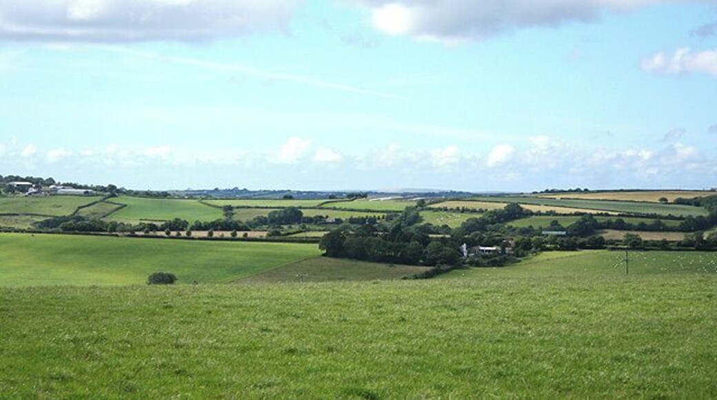 High Bickington: towards Lower Chapple Lower Chapple stands on the site of St Johns Chapel, within the square and by the Atherington Torrington road. It can be seen on the horizon on the extreme left. Looking north-north-west