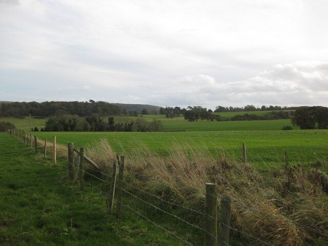 Lulworth area North Lodge looking south across fields toward possibly Whiteways Hill dropping down into Woolbarrow Bay.
