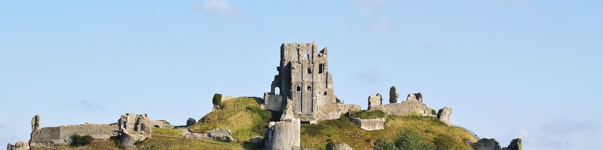 A view of Corfe Castle from just outside the village of the same name.