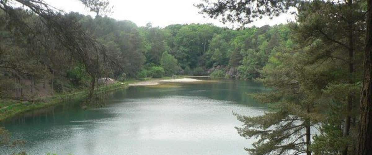 Furzebrook: Blue Pool Blue Pool is a remnant of a Purbeck clay pit which was in use from the 16th to 19th centuries and survives only because the prospectors couldn't be bothered to fill in what they left behind.