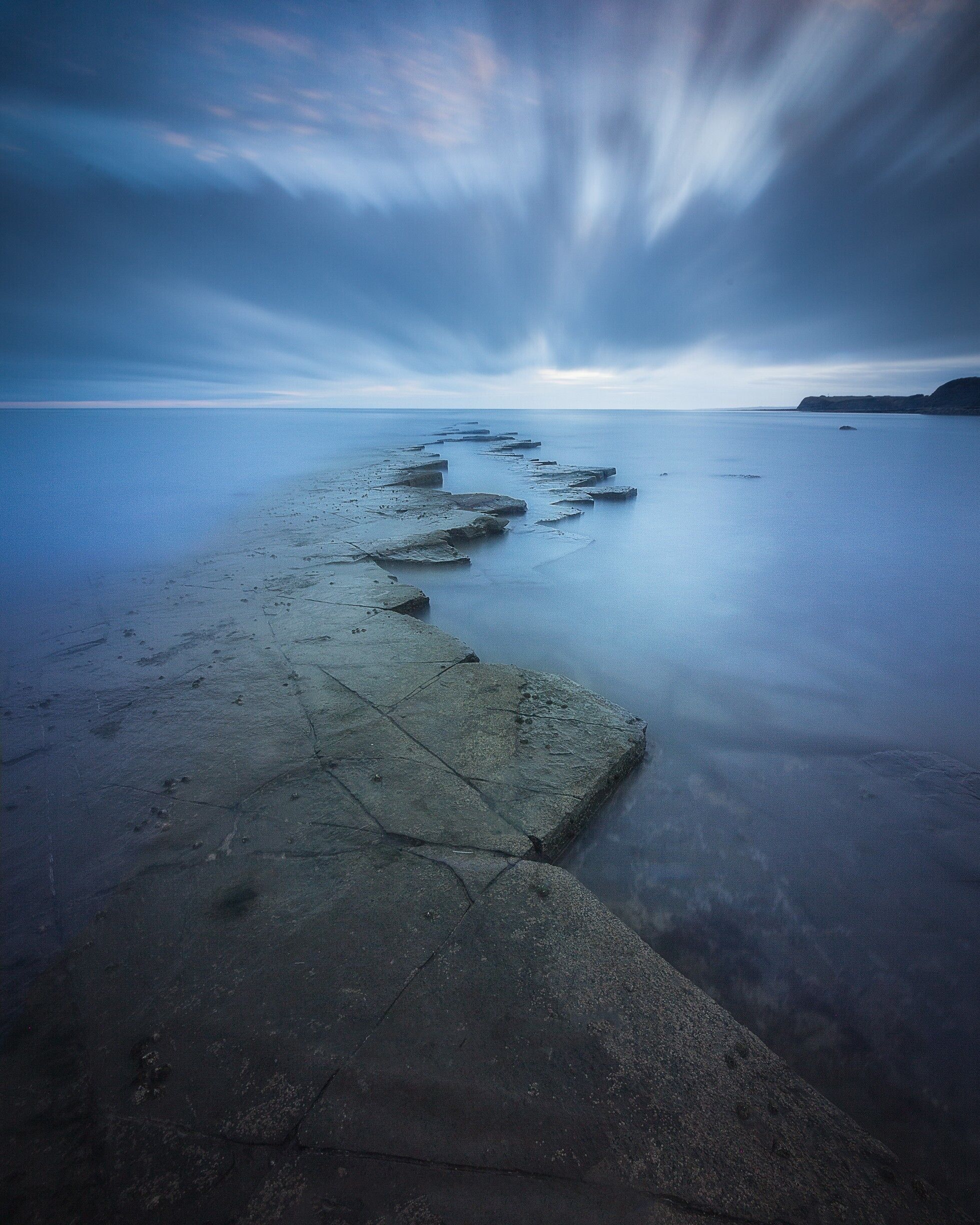 These awesome rocks piercing out into the ocean make a great leading line to the approaching storm but were once used by the Coast Guard’s wives as a great place to wash their laundry !