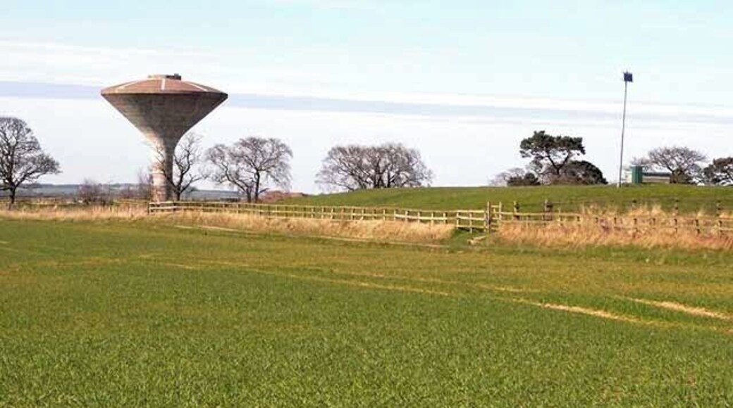 Water tower and reservoir This remarkable water tower, looking like a magic mushroom, or possibly a hooded cobra, together with a covered reservoir stands on a slight rise near Morwick Farm, outside Warksworth.