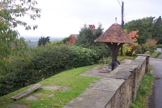 Toy's Hill Viewpoint On Puddledock Lane. Has a very low bench and old wishing well.