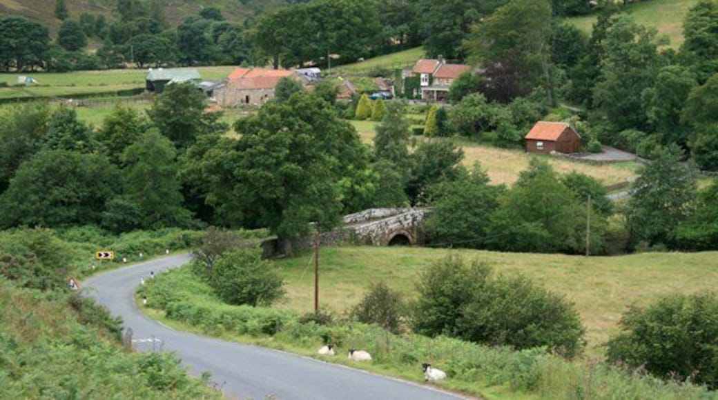 Dibble Bridge Over the River Esk with Dibble Bridge Farm on the far bank.