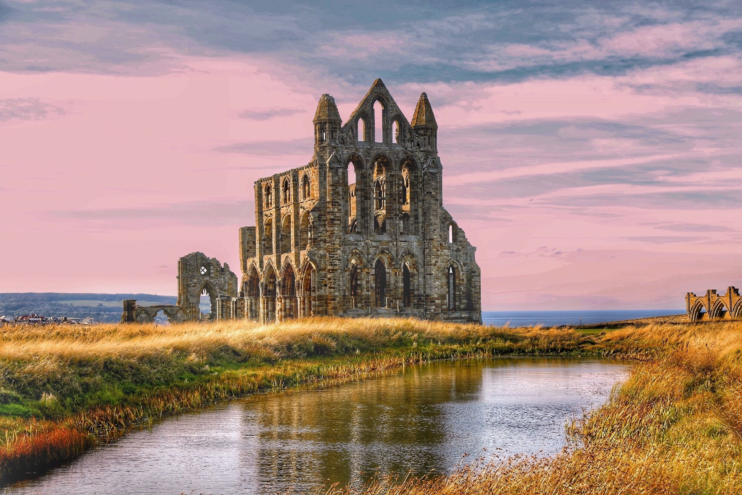 The beautiful Whitby Abbey at sunset.