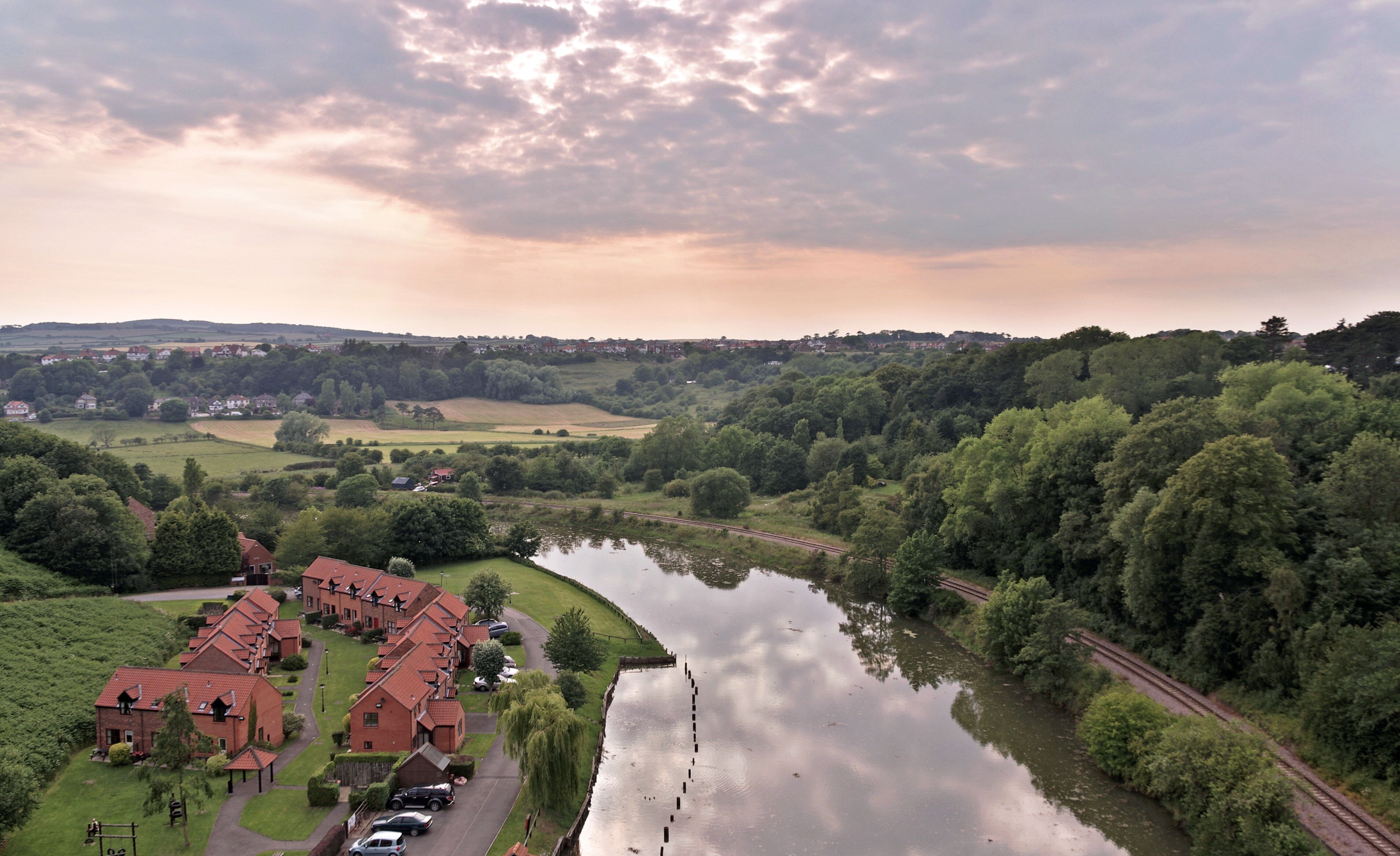 View west from the Larpool Viaduct (originally the Scarborough and Whitby Railway) across the River Esk (and the Esk Valley Line).