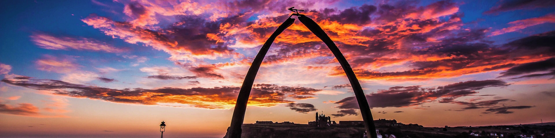 Early morning start to the day for a sunrise in Whitby North Yorkshire late winter but a great start to a day. A cold early morning in this location is the best to wait for the sunrise at it will rise just below the Abbey Cliff in the distance. The famous abbey which is standing out on the other side of the river Esk. A number of seat in this area for a relaxing sit down but not many people about because of the cold. Best part of the day.