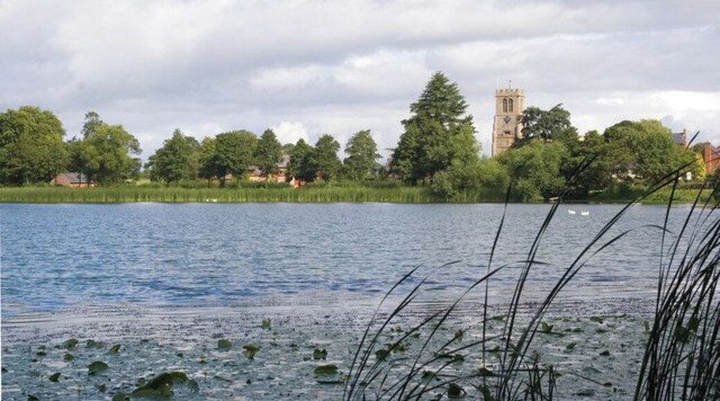 Hanmer Mere. Photograph taken looking towards the Parish Church of St. Chad in the village of Hanmer.
