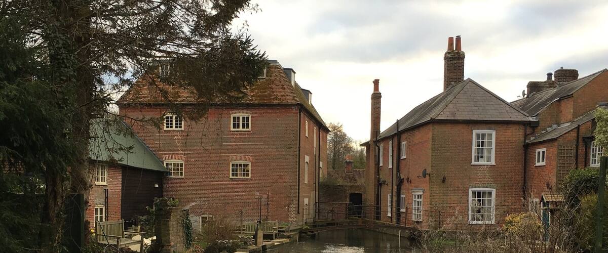 Photo of the back of the Mill taken from the garden just a little up river