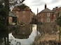 Photo of the back of the Mill taken from the garden just a little up river