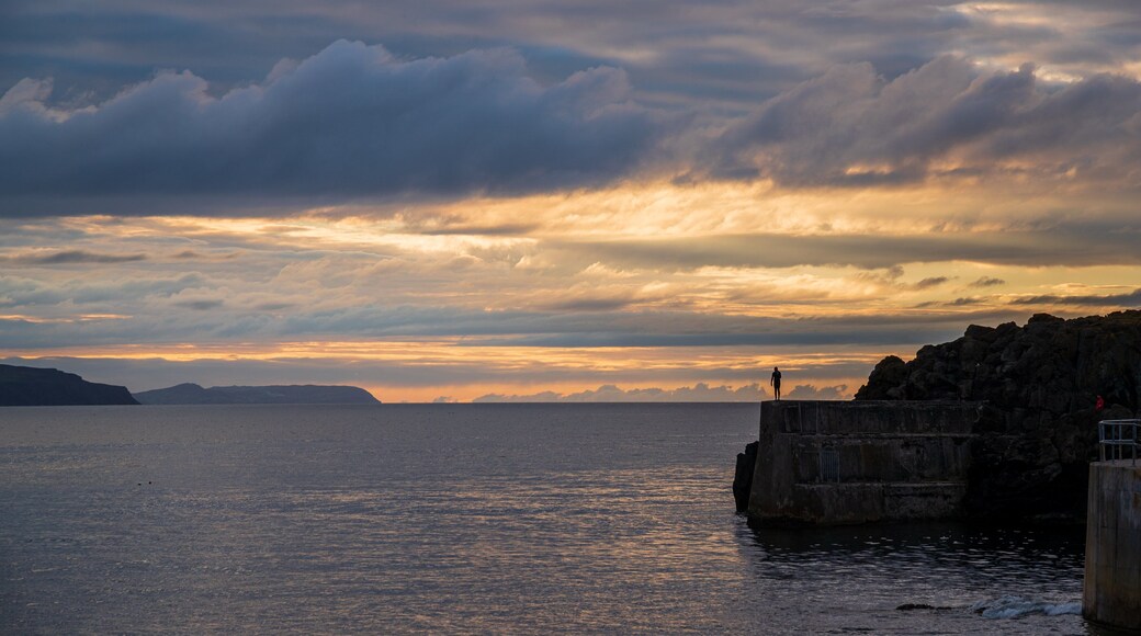 Portstewart showing general coastal views and a sunset