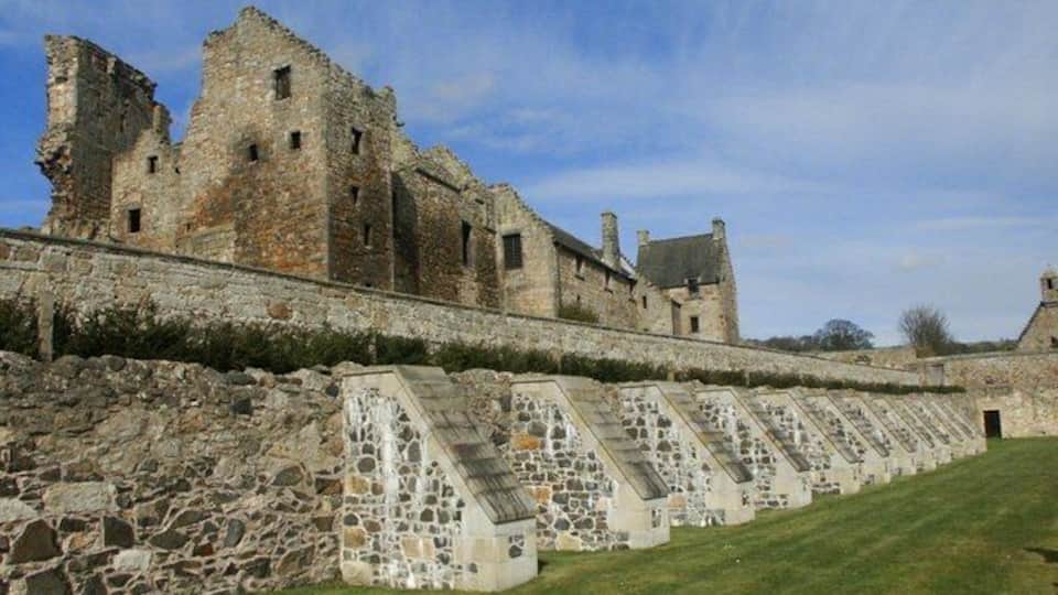 Aberdour Castle The stone buttresses, in the foreground, are a fairly recent construction addition and help support an ageing wall. Part of a tiered garden at this 12th century castle.