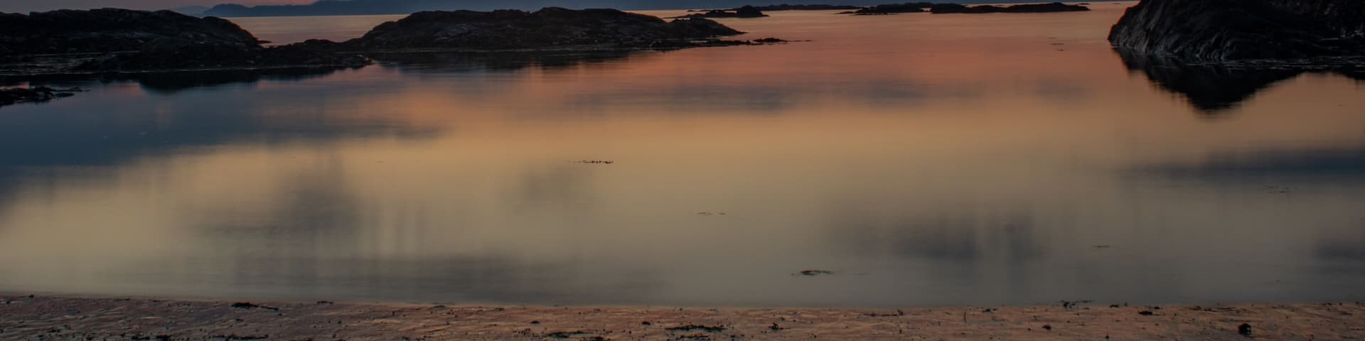 Sunsetting behind the distant Cullins (Isle of Skye) from Silversands