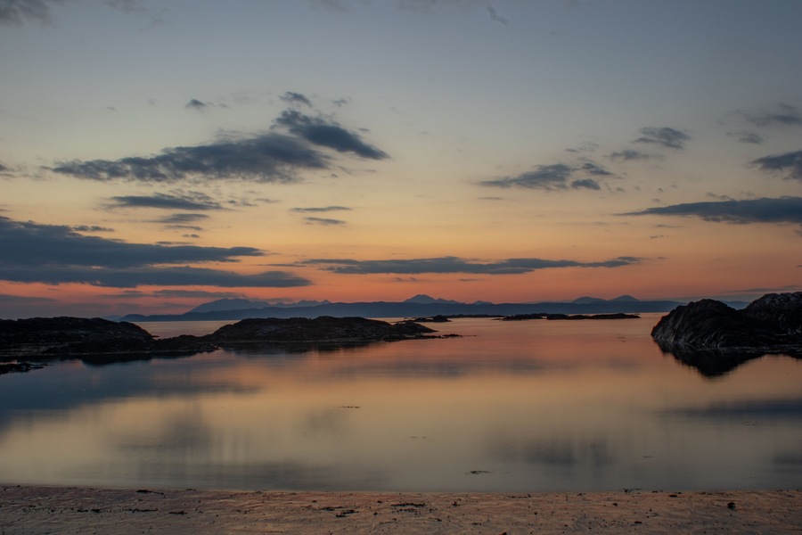 Sunsetting behind the distant Cullins (Isle of Skye) from Silversands