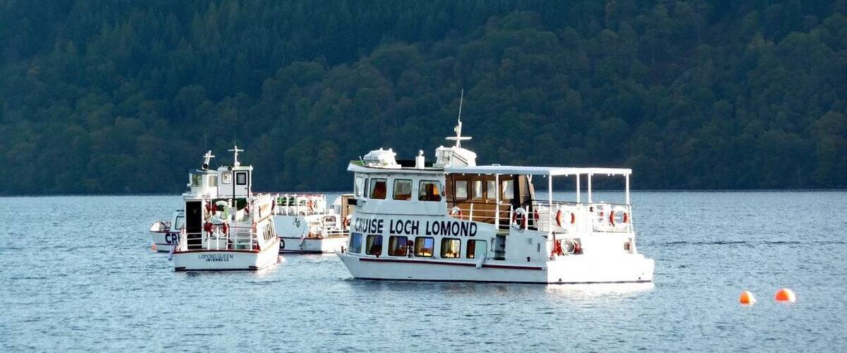 Cruise Loch Lomond - boats moored off Tarbet Pier
