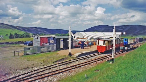 Leadhills: restored station, with narrow-gauge train, 2000. View NE, towards Elvanfoot: ex-Caledonian Railway Elvanfoot - Wanlockhead line, closed entirely 2/1/39, but restored by the heritage Leadhills & Wanlockhead Railway (2 ft. gauge).
