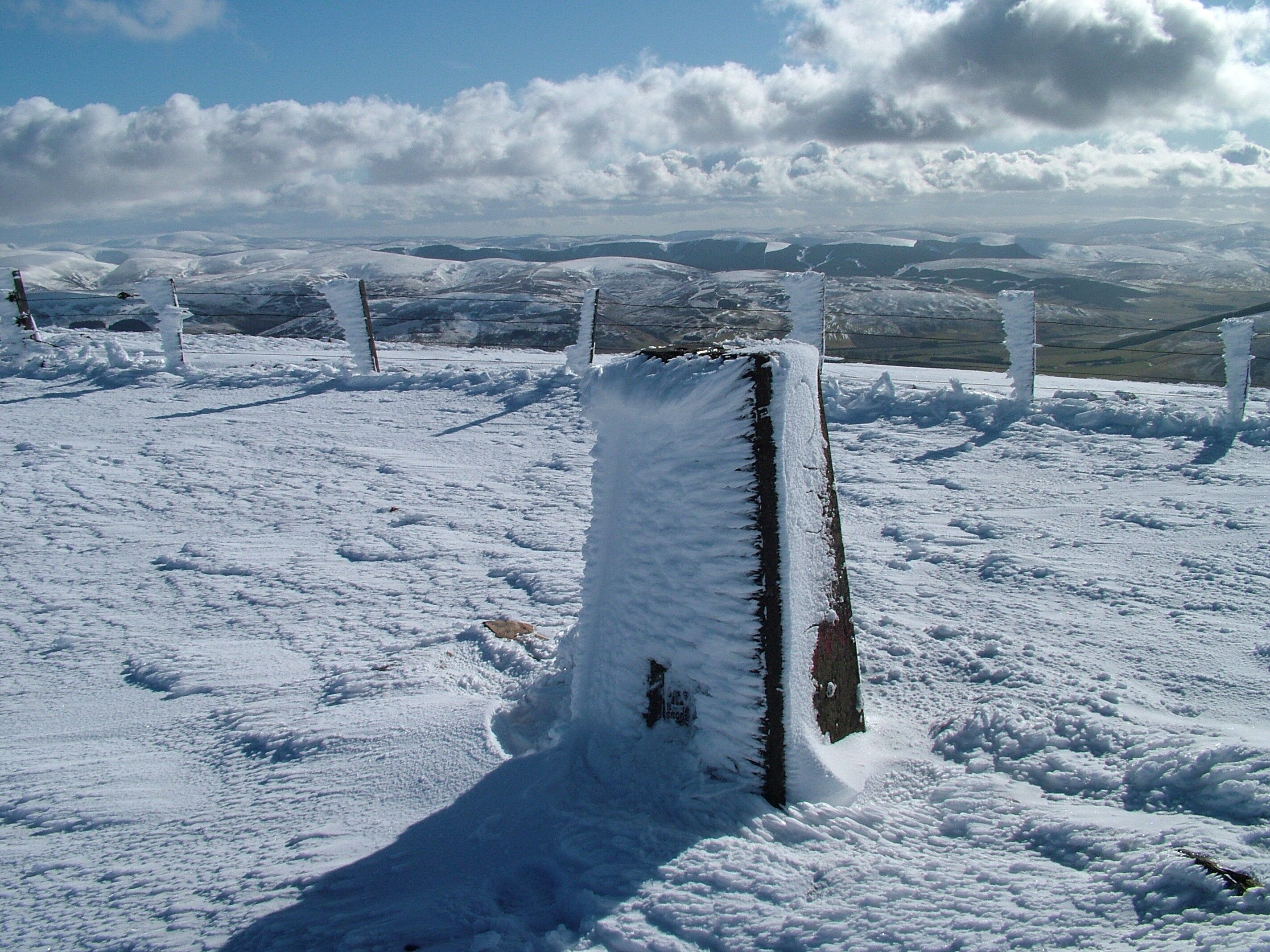 Trig point and ice architecture, Tinto Hill