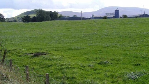 Quothquan Law and Tinto Looking south west from Eastertown farm towards Quothquan Law on the left and Tinto mountain on the right. The silhouette of Roadhead farm can be seen in the middle distance.