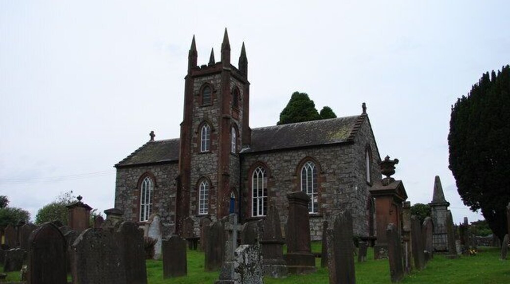 Kells Parish Church, New Galloway. Kells Parish Church is a rough granite cruciform kirk, the south limb formed by the battlemented tower. It stands in a fine setting above the Royal Burgh of New Galloway. The churchyard has interesting headstones including an Adam & Eve stone, Martyrs' memorials and a gamekeeper's grave 867126