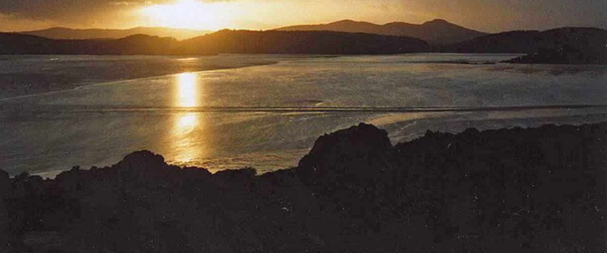 Sunset over Rough Firth View west to Castle Hill.