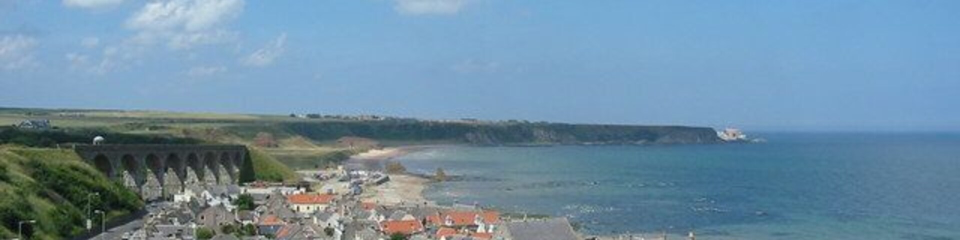 Seatown and Cullen beach from disused railway Looking over the Seatown and the Three Kings to the Scar Nose at Portknockie