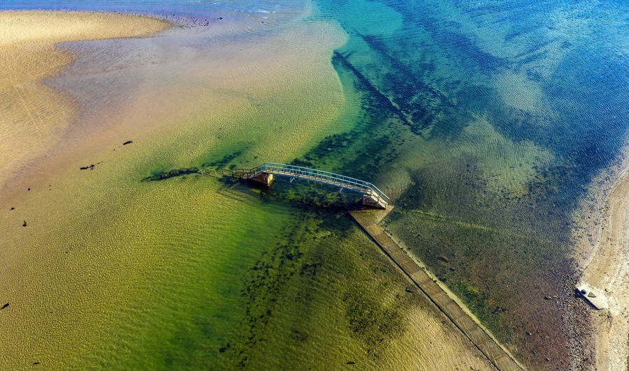 Aerial view of Bridge to Nowhere in Belhaven Bay, Dunbar, Scotland.