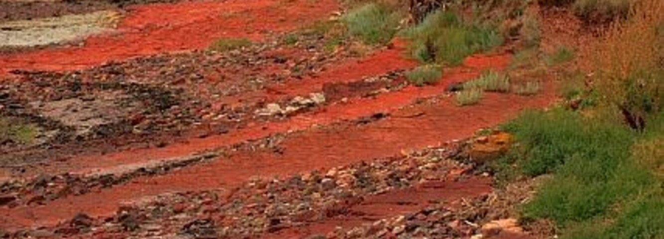 Sedimentary Rocks, Belaven Bay The golf course on the right is on an area of raised beach. During the last ice age it would have been part of the beach, kept there by the weight of the ice.With the melting of the ice the land rose.