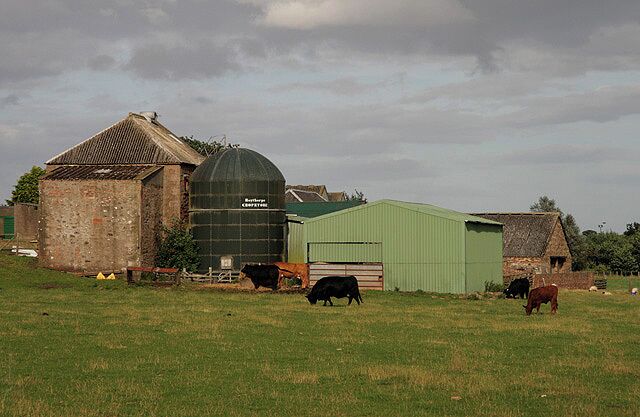Farm buildings at Greenlaw Viewed from a footbridge over the Blackadder Water. The farm on the south side of the village is unnamed on the Explorer Map.