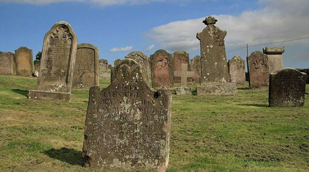 Chirnside Parish Church graveyard An interesting mix of headstones at the corner of the square. 4 squares converge in this graveyard. The kirkyard was the site of a famous resurrection in 1764 when Marjorie Halcrow Erskine, the second wife of the Revd Henry Erskine, was laid to rest in a shallow grave by the sexton who later returned to steal her jewellery. While he was trying to cut off her finger to steal a ring, the corpse awoke and dashed off across the kirkyard to the manse door, which she pleaded the minister to open For Im fair clemmed withe cauld. Apparently, in her additional years of life, she gave birth to two sons, Ralph and Ebenezer Erskine, who founded the Secession Church. The fate of the sexton is not known