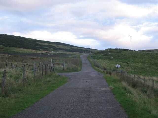 The lane through Farr. A view looking southeast along the lane through the scattered community of Farr.