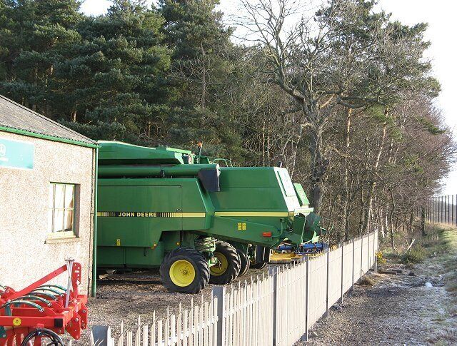 Any colour you like as long as it's green Well several actually. Netherton Tractors, a John Deere dealer, beside Tolmuir Wood.