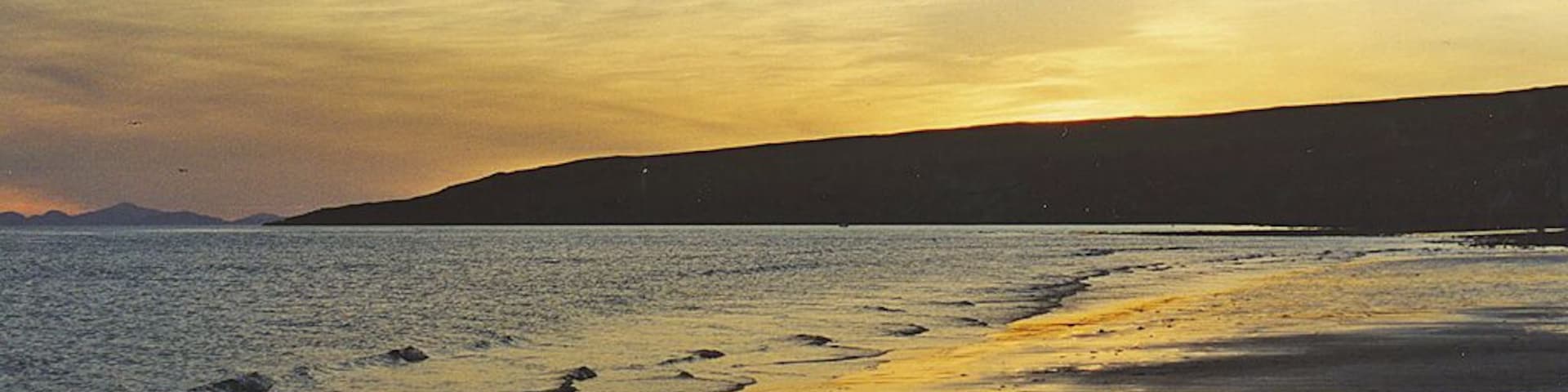 Sunset from Sands beach Late summer evenings here can be superb. The Outer Hebrides can be seen on the left.
