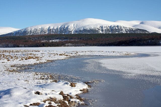 Loch Insh Looking across the southwestern end of the loch towards Creag Mhigeachaidh, Glen Feshie.