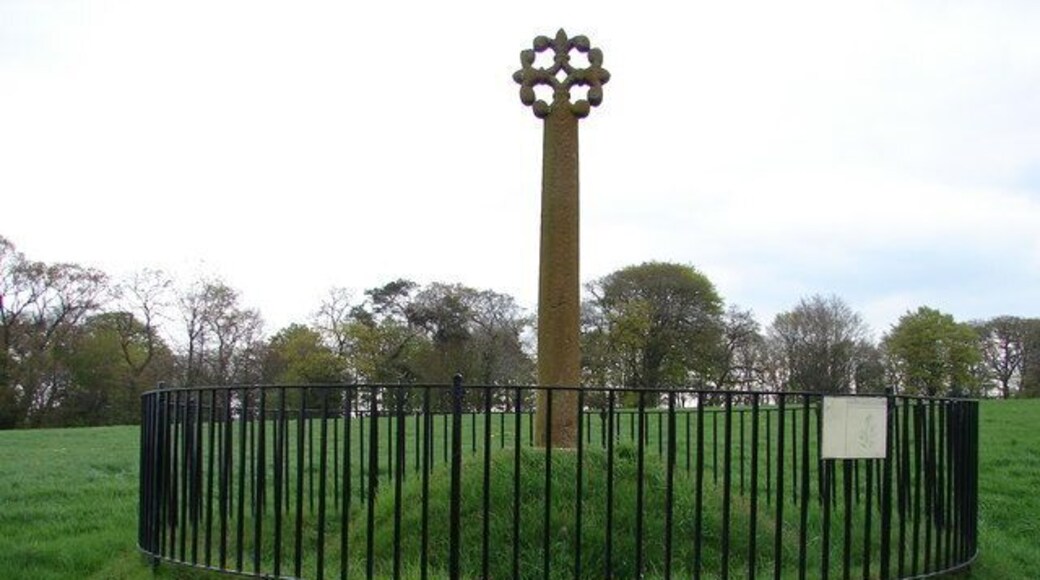 Merkland Cross, Kirtlebridge The Merkland Cross (Historic Scotland) is a fine 15th century 3m/9.9ft high wayside cross complete with floriated head. Its commemoration is unknown. The cross stands just above the southbound carriageway of the A74(M) near Kirtlebridge.