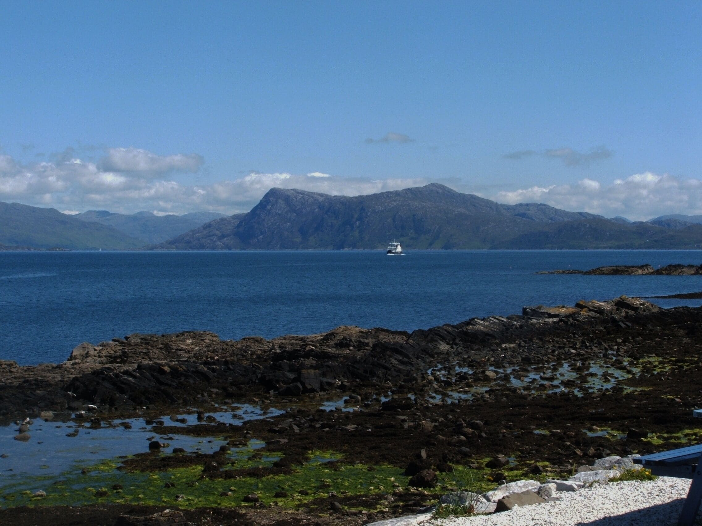 Looking from the isle of Skye toward's Scotland's mainland awaiting the ferry from Armedale to Mallaig a must if returning from the island. If you like Harry Potter along the road from Mallaig to Fort William you will past the famous arched railway bridge. 