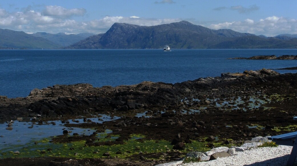 Looking from the isle of Skye toward's Scotland's mainland awaiting the ferry from Armedale to Mallaig a must if returning from the island. If you like Harry Potter along the road from Mallaig to Fort William you will past the famous arched railway bridge.