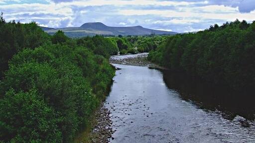 Looking up the River Orrin. Taken from the Road Bridge.