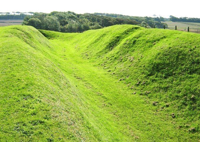 Massage defensive ditch at Rispain Settlement This view of the massive ditch at Rispain is looking south, along the ditch. Looking at the nearby trees gives an idea of just how big the ditch is.