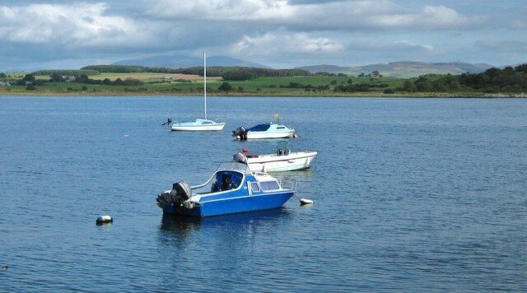 Garlieston Bay This view of Garlieston Bay is taken from the harbour wall, to the left of the jetty. Across the bay, Eggerness Woods can be seen on the right.