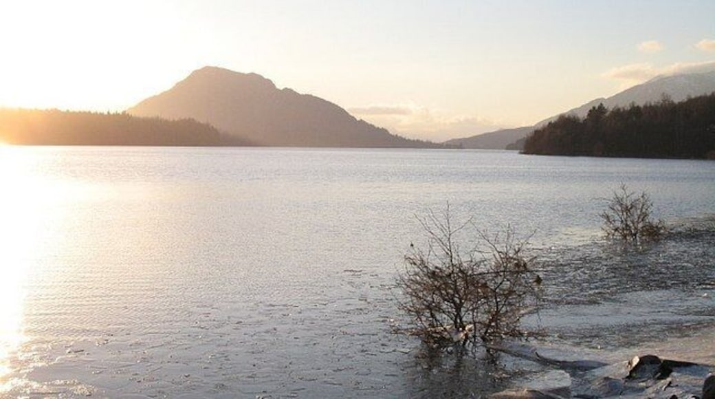 Loch Laggan Ice forming on the sides of Loch Laggan with a view towards Binnein Shios. The loch has been enlarged by a dam in Glen Spean, the water used to power the aluminium smelters in Fort William.