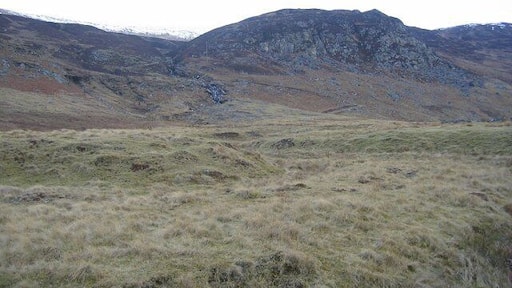 Creagan Soilleir. Craggy hillside above Laggan. The end of the improved farmland.