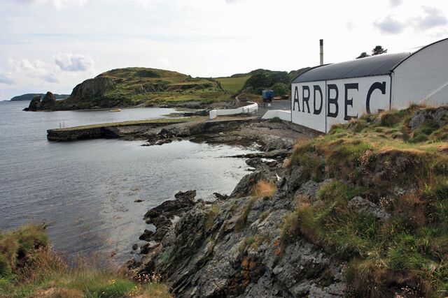 A coastal scene with a building labeled 'ARDBEC' and rocky terrain.