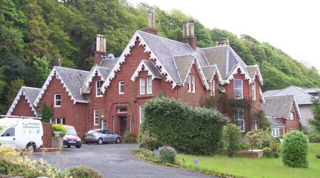 Red sandstone house. A substantial building with ornate gables and chimney pots. One of the few remaining red sandstone buildings on Shore Road, Skelmorlie.